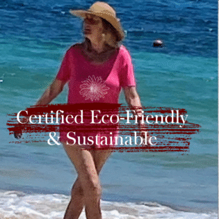 Person in pink enjoying beach, labelled eco-friendly.